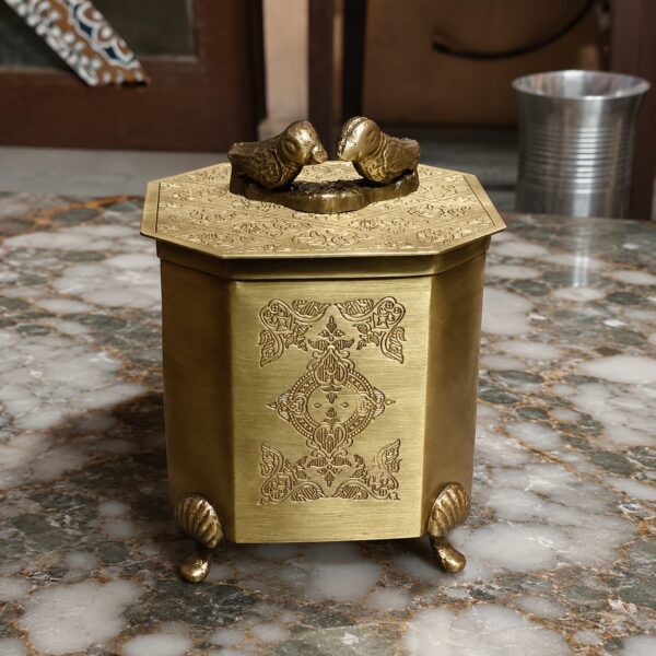 WhatsApp Image 2026-06-14 at 4.20.08 AM (1) Pure Brass Decorative Storage Jar with Bird Design Lid, Engraved Antique Finish Container Box, 5.5 Inch Height, 750 Gram